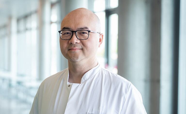 Portraitfoto von Da Huo