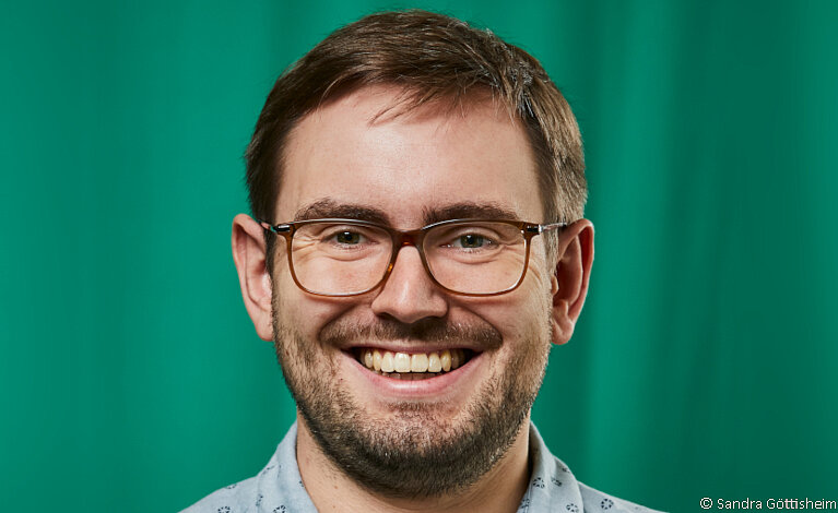 Portraitfoto von Dominik Beyer