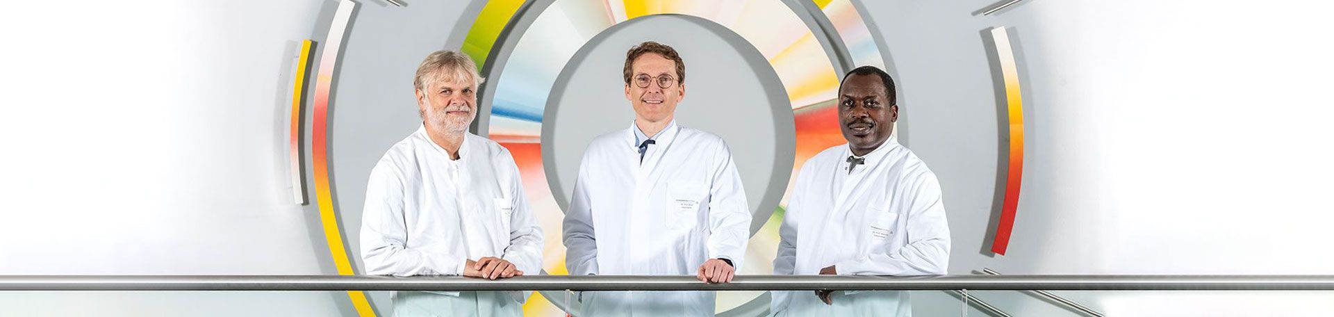 Foto von Prof. Dr. rer. nat. Laßmann, Prof. Dr. med. Buck und Univ.-Prof. Dr. rer. nat. Samnick