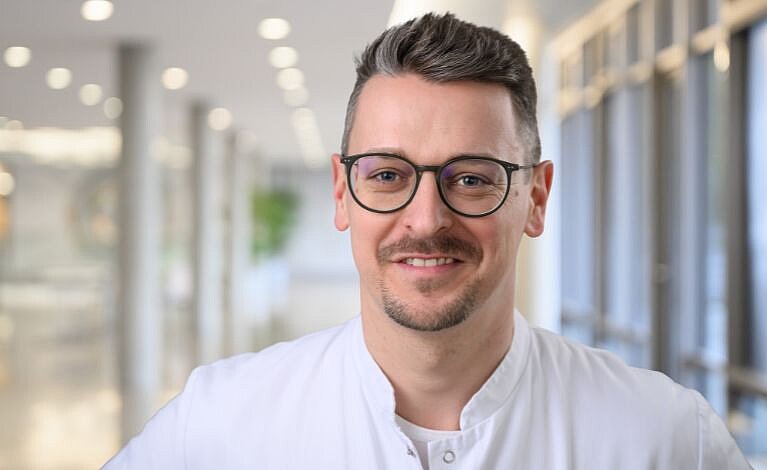 Portraitfoto von Andreas Pospiech