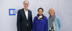 Cynthia Sharma, Caroline Kisker und Universitätspräsident Paul Pauli
