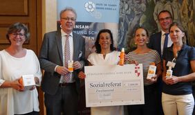 2.000 Euro für Sonnenschutzcreme - Gruppenbild