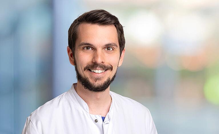 Portraitfoto von Dr. med. Manuel Vogel