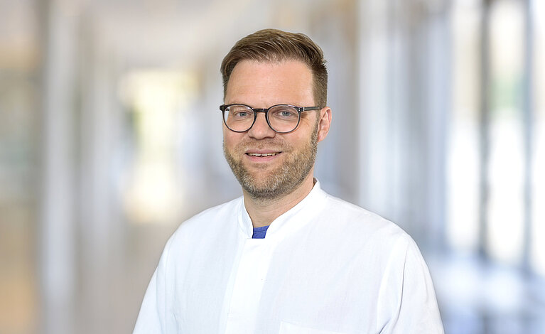 Portraitfoto von Tilmann Neun